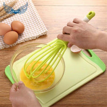 Handy plastic whisk mixer for whipping milk, coffee, eggs, and juice.