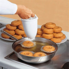 Simple donut and vada dispenser with easy grip for smooth operation.