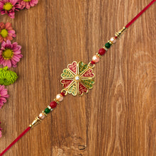 Traditional Kundan Rakhi With Golden Floral Base And Rudraksha Beads