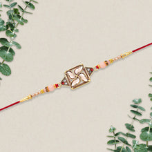 Designer Rakhi With Swastik-inspired Kundan Dial And Decorative Beads